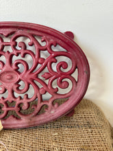 Load image into Gallery viewer, Vintage Cast Iron Pinky Red Trivet

