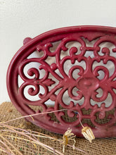 Load image into Gallery viewer, Vintage Cast Iron Pinky Red Trivet

